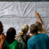 Colombianos en Venezuela votan en plena ola migratoria
