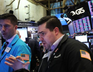Wall Street opera volátil tras recorte de la Fed y el Dow Jones sube 0,46%