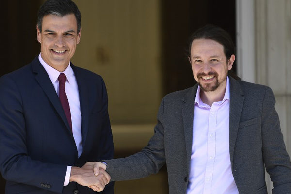 Socialista Pedro Sánchez logra mayoría y Podemos entra al gobierno español