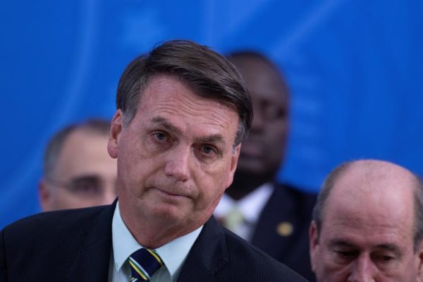 Bolsonaro y empresarios abogan por reapertura de la economía pese a pandemia
