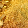 Precio del oro inicia la semana en declive por dudas sobre estímulo en EE.UU
